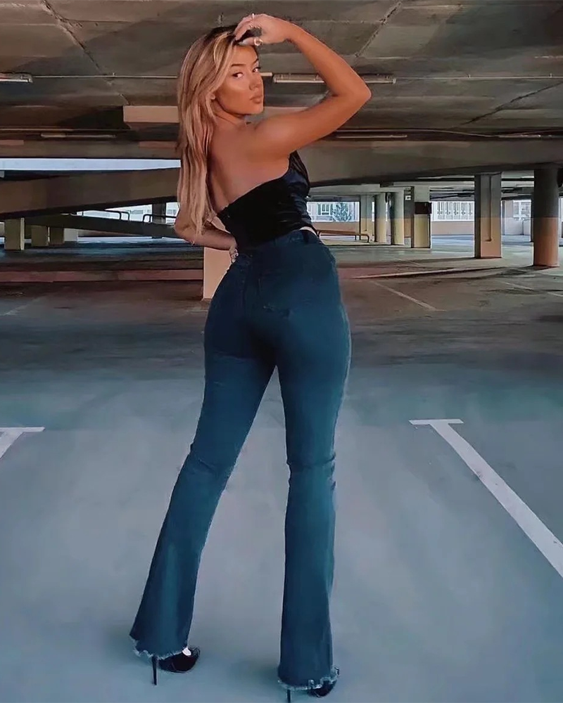 High-Rise-Stretch-Schlagjeans im Slim-Fit mit Raw Edge